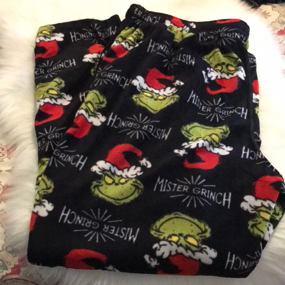 The Grinch Fleece Pajama Pants. SZ XL. Includes a pair of socks